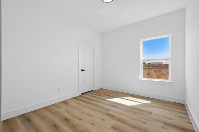 3923 Le May Ave, Dallas, TX 75216 - empty room with baseboards and wood finished floors