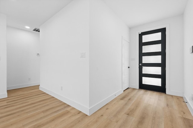 3923 Le May Ave, Dallas, TX 75216 - entryway with light wood-type flooring, baseboards, and recessed lighting
