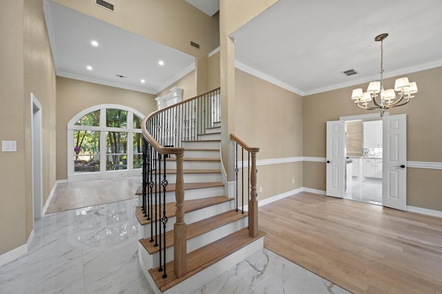 1002 Hidden Knoll Ct, Southlake, TX 76092 - entrance foyer with a chandelier, crown molding, light marble finish floors, stairs, and recessed lighting