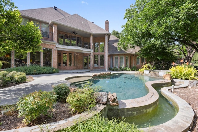 9922 Lakeway Ct, Dallas, TX 75230 - view of swimming pool with ceiling fan, a patio, and a pool with connected hot tub