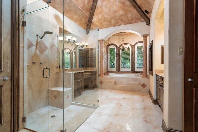 9922 Lakeway Ct, Dallas, TX 75230 - full bathroom with a chandelier, vanity, a bath, plenty of natural light, and vaulted ceiling