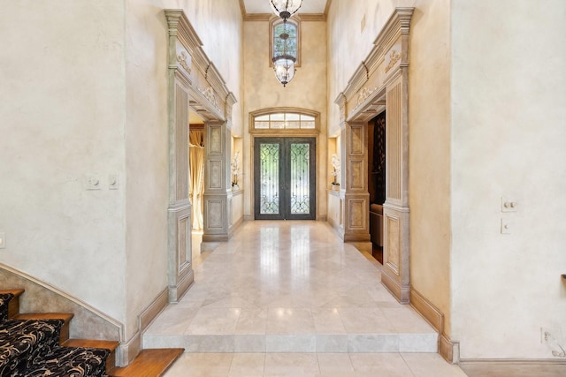 9922 Lakeway Ct, Dallas, TX 75230 - entrance foyer with french doors and a towering ceiling