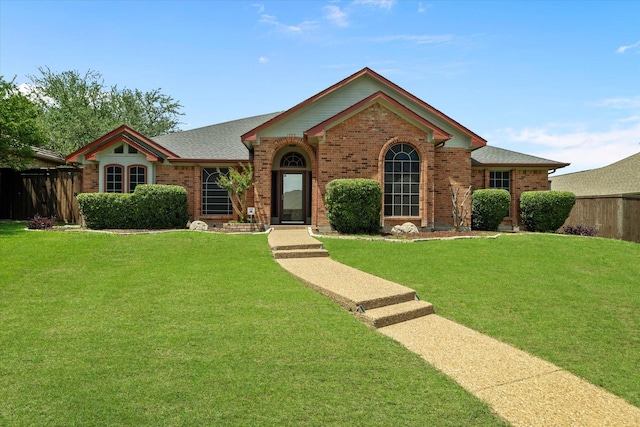 1405 Danube Ln, Plano, TX 75075 - view of front of home with brick siding and roof with shingles