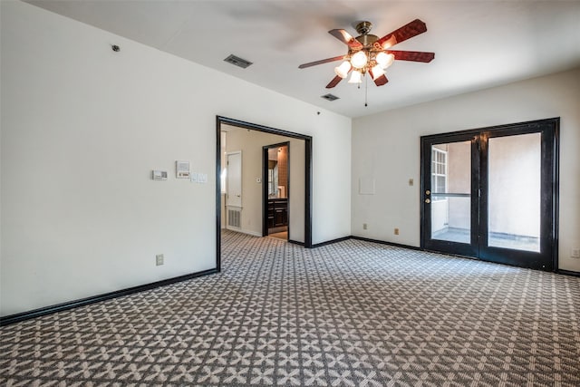 905 Liberty St, Dallas, TX 75204 - unfurnished room with carpet flooring, baseboards, and ceiling fan