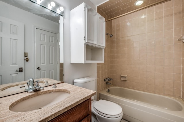905 Liberty St, Dallas, TX 75204 - bathroom featuring toilet, vanity, and washtub / shower combination