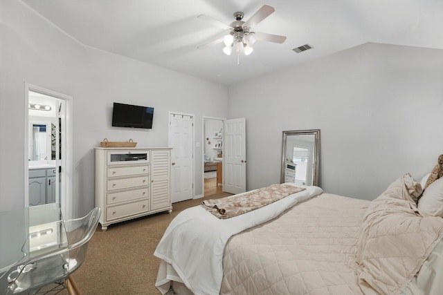 15429 Calico Ct, Frisco, TX 75035 - bedroom featuring vaulted ceiling, dark carpet, ceiling fan, and ensuite bathroom