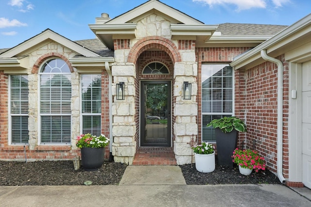 15429 Calico Ct, Frisco, TX 75035 - entrance to property with brick siding, a shingled roof, and stone siding