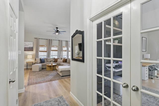 15429 Calico Ct, Frisco, TX 75035 - hall featuring wood finished floors, a desk, and baseboards