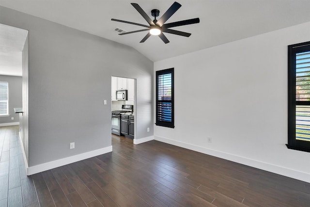 3013 Flowering Springs Dr, Forney, TX 75126 - unfurnished room with ceiling fan, vaulted ceiling, baseboards, and dark wood-style floors