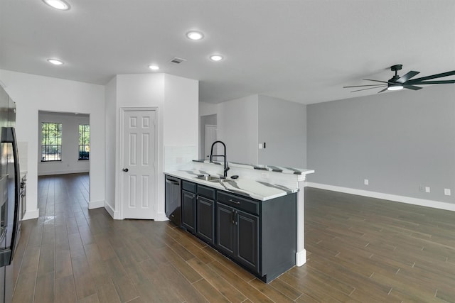 3013 Flowering Springs Dr, Forney, TX 75126 - kitchen with baseboards, a sink, dark wood finished floors, and recessed lighting