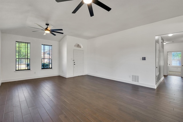 3013 Flowering Springs Dr, Forney, TX 75126 - unfurnished living room featuring a ceiling fan, dark wood-type flooring, and baseboards