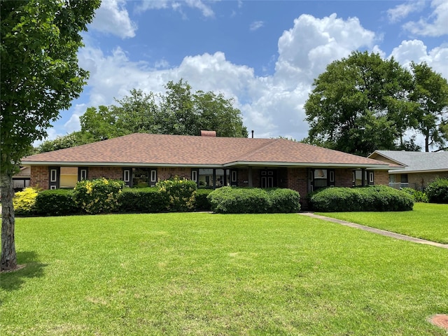 310 Lancashire Dr, Bossier City, LA 71111 - ranch-style home with a front yard and brick siding