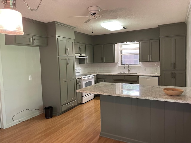 310 Lancashire Dr, Bossier City, LA 71111 - kitchen with white appliances, a sink, exhaust hood, light wood-style flooring, and a ceiling fan