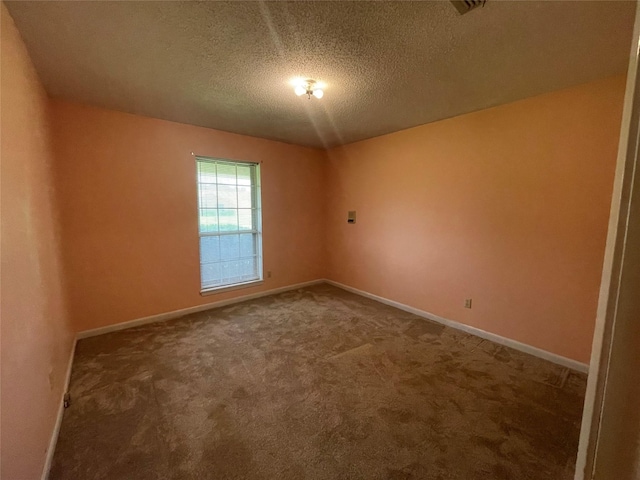 310 Lancashire Dr, Bossier City, LA 71111 - unfurnished room with carpet flooring, a textured ceiling, and baseboards