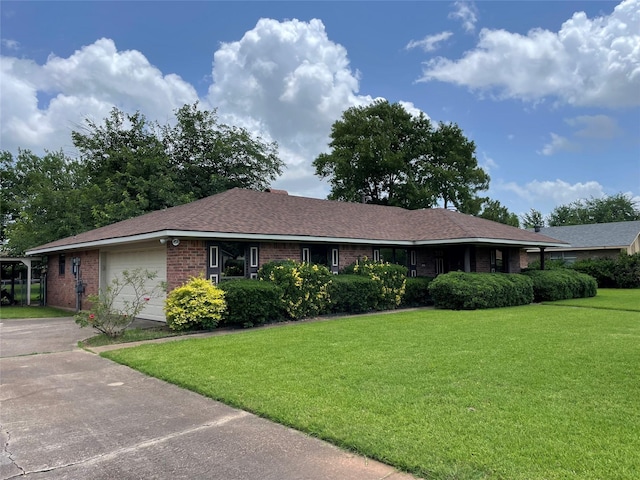 310 Lancashire Dr, Bossier City, LA 71111 - ranch-style house with brick siding, an attached garage, a front yard, and concrete driveway