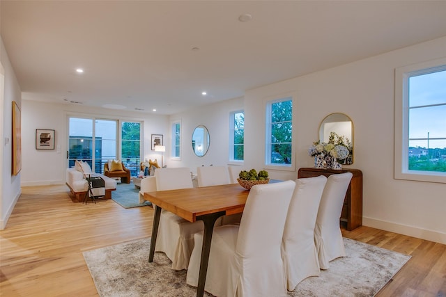 7207 Gaston Ave Unit 1006, Dallas, TX 75214 - dining room with light wood-style flooring, baseboards, and recessed lighting