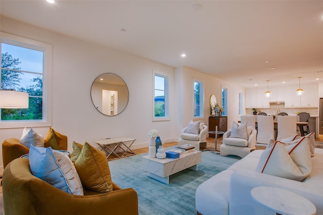 7207 Gaston Ave Unit 1006, Dallas, TX 75214 - living room featuring recessed lighting, light wood finished floors, and baseboards