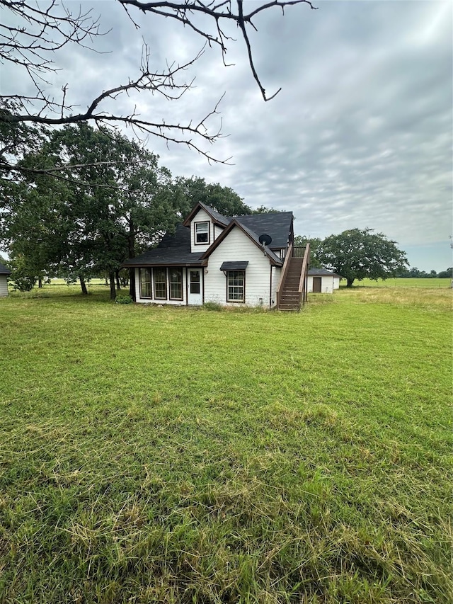 239 Cundiff Crafton Rd, Chico, TX 76431 - rear view of house featuring a lawn