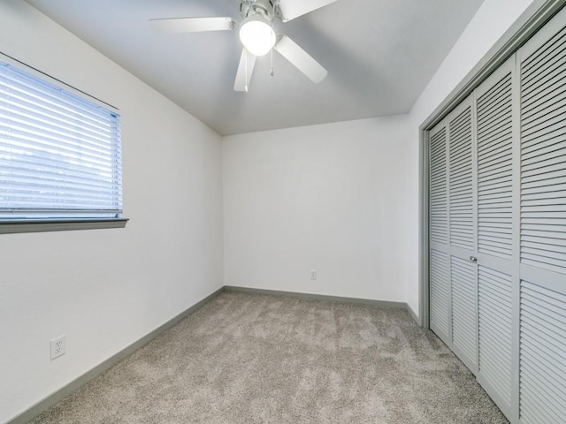 100 Trellis Pl Unit 102, Richardson, TX 75081 - unfurnished bedroom with light carpet, a closet, baseboards, and ceiling fan