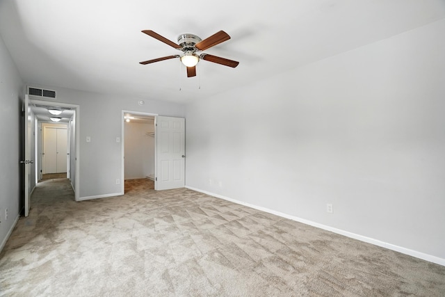 2729 Caton Pl, Abilene, TX 79605 - unfurnished bedroom featuring carpet flooring, a walk in closet, baseboards, ceiling fan, and a closet