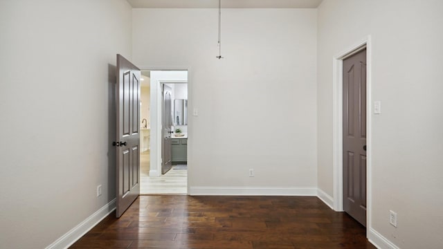 713 N Jordan Rd, Mckinney, TX 75071 - unfurnished room with wood-type flooring and baseboards