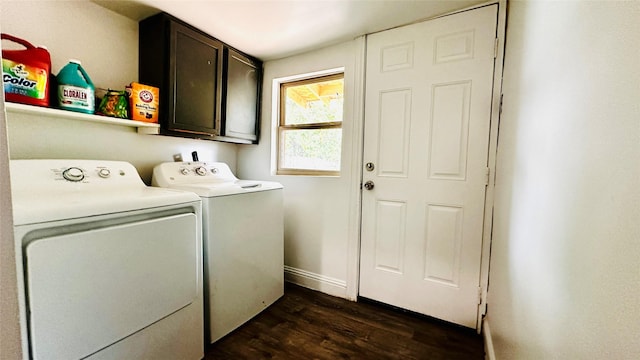 3030 Warren Ave, Dallas, TX 75215 - washroom featuring cabinet space, washer and clothes dryer, dark wood finished floors, and baseboards