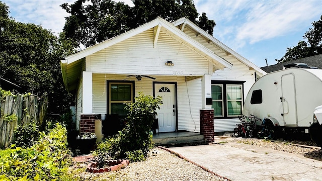3030 Warren Ave, Dallas, TX 75215 - shotgun-style home featuring ceiling fan and brick siding