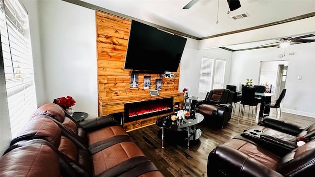 3030 Warren Ave, Dallas, TX 75215 - living room with ceiling fan, wood finished floors, healthy amount of natural light, and ornamental molding
