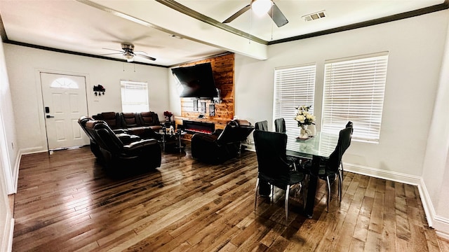 3030 Warren Ave, Dallas, TX 75215 - dining area with ceiling fan, dark wood-style flooring, crown molding, and baseboards
