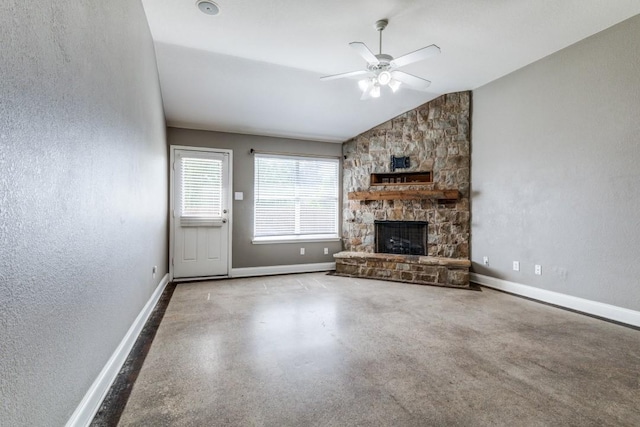 1128 Diablo Pass, Fort Worth, TX 76052 - unfurnished living room with a stone fireplace, baseboards, ceiling fan, vaulted ceiling, and a textured wall