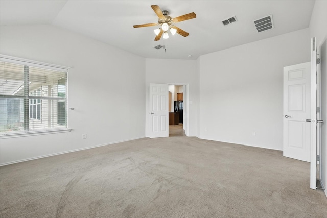 209 Lariat Dr, Fate, TX 75087 - carpeted empty room featuring a ceiling fan and vaulted ceiling