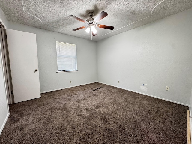 1050 35th St NE, Paris, TX 75462 - spare room with a ceiling fan, carpet floors, and a textured ceiling