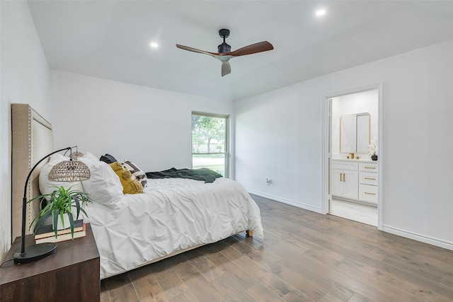1112 Seabrook Dr, Plano, TX 75023 - bedroom with wood finished floors, baseboards, connected bathroom, recessed lighting, and a ceiling fan