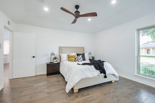1112 Seabrook Dr, Plano, TX 75023 - bedroom with wood finished floors, baseboards, recessed lighting, and ceiling fan