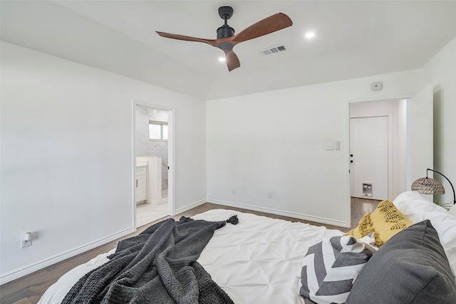 1112 Seabrook Dr, Plano, TX 75023 - bedroom featuring wood finished floors, baseboards, ceiling fan, and ensuite bathroom