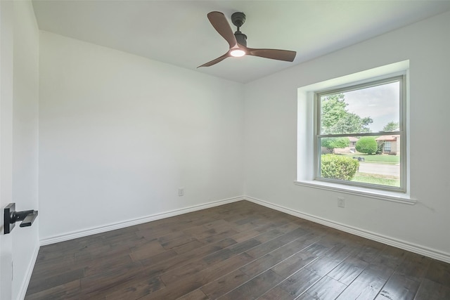 1112 Seabrook Dr, Plano, TX 75023 - unfurnished room with dark wood finished floors, baseboards, and ceiling fan