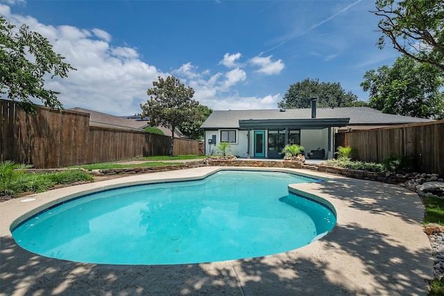 1112 Seabrook Dr, Plano, TX 75023 - view of pool with a fenced backyard and a patio area