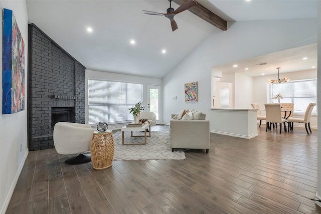 1112 Seabrook Dr, Plano, TX 75023 - living area featuring beamed ceiling, ceiling fan, baseboards, dark wood finished floors, and a chandelier