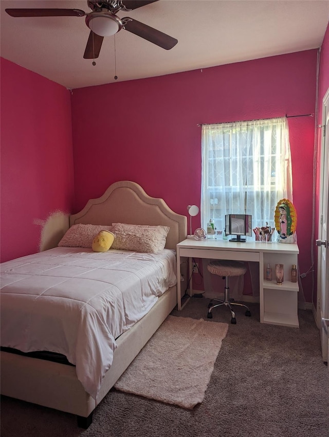2715 Britton Ave, Dallas, TX 75216 - carpeted bedroom with an office area and a ceiling fan