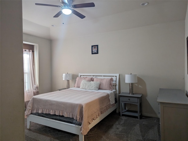 2715 Britton Ave, Dallas, TX 75216 - bedroom with carpet, a ceiling fan, and baseboards