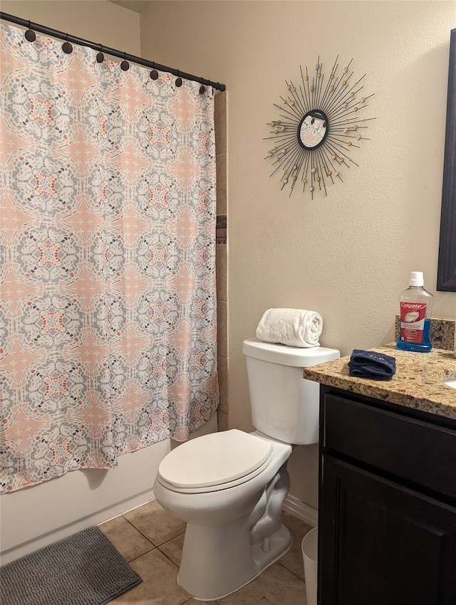 2715 Britton Ave, Dallas, TX 75216 - bathroom with toilet, vanity, and tile patterned flooring