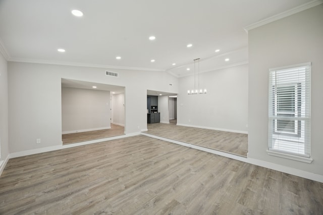 1629 Mesquite Trl, Plano, TX 75023 - unfurnished living room with lofted ceiling, ornamental molding, healthy amount of natural light, baseboards, and light wood finished floors