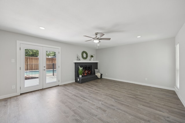 1629 Mesquite Trl, Plano, TX 75023 - unfurnished living room with french doors, a ceiling fan, wood finished floors, recessed lighting, and baseboards