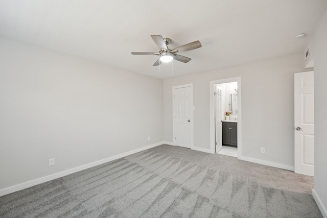 1629 Mesquite Trl, Plano, TX 75023 - unfurnished bedroom featuring carpet flooring, baseboards, a ceiling fan, and ensuite bathroom