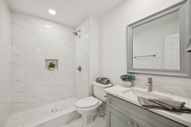 1629 Mesquite Trl, Plano, TX 75023 - bathroom featuring vanity, toilet, a marble finish shower, recessed lighting, and marble finish flooring