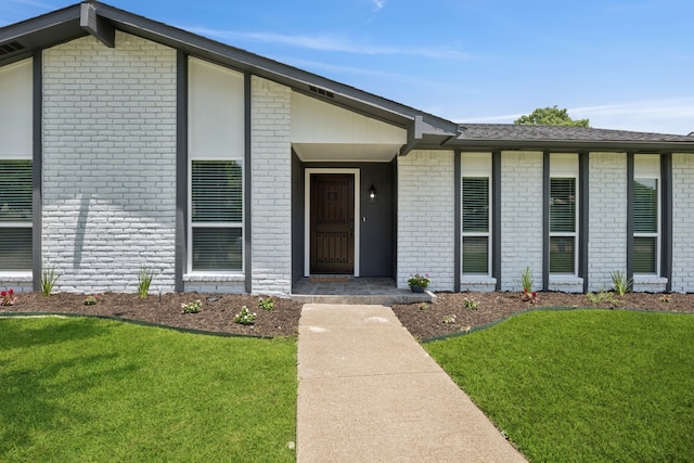 1629 Mesquite Trl, Plano, TX 75023 - view of front of property featuring brick siding and a front yard