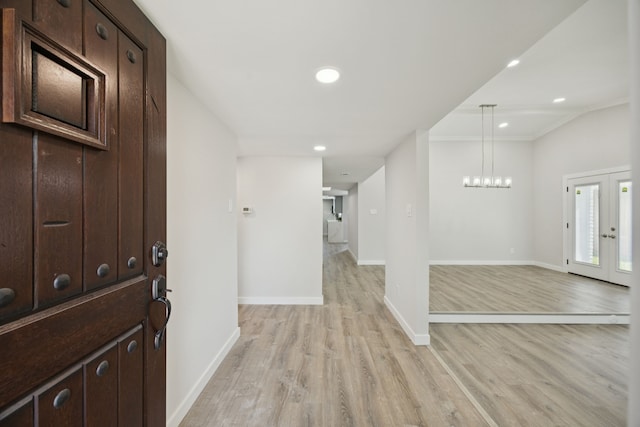 1629 Mesquite Trl, Plano, TX 75023 - entryway with baseboards, light wood-type flooring, a chandelier, recessed lighting, and ornamental molding