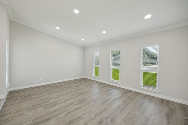 1629 Mesquite Trl, Plano, TX 75023 - spare room with ornamental molding, baseboards, recessed lighting, and light wood-type flooring