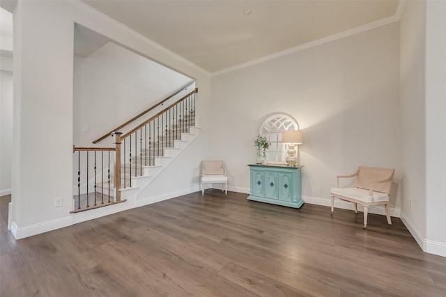 1302 Middleton Dr, Rockwall, TX 75087 - sitting room with wood finished floors, ornamental molding, stairs, and baseboards