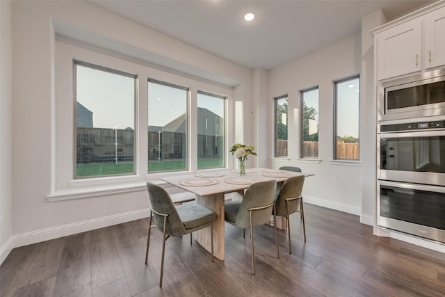 1302 Middleton Dr, Rockwall, TX 75087 - dining area featuring baseboards, dark wood-style flooring, and recessed lighting